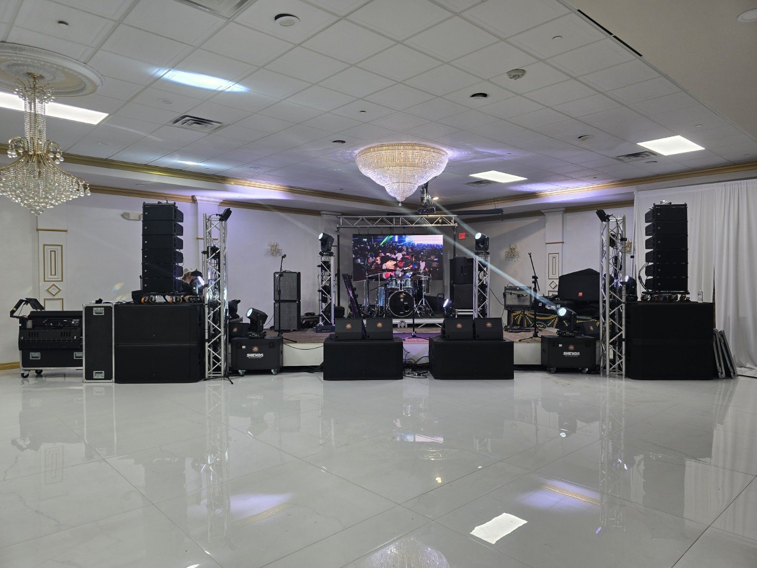 Complete ballroom stage production with line arrays and lighting