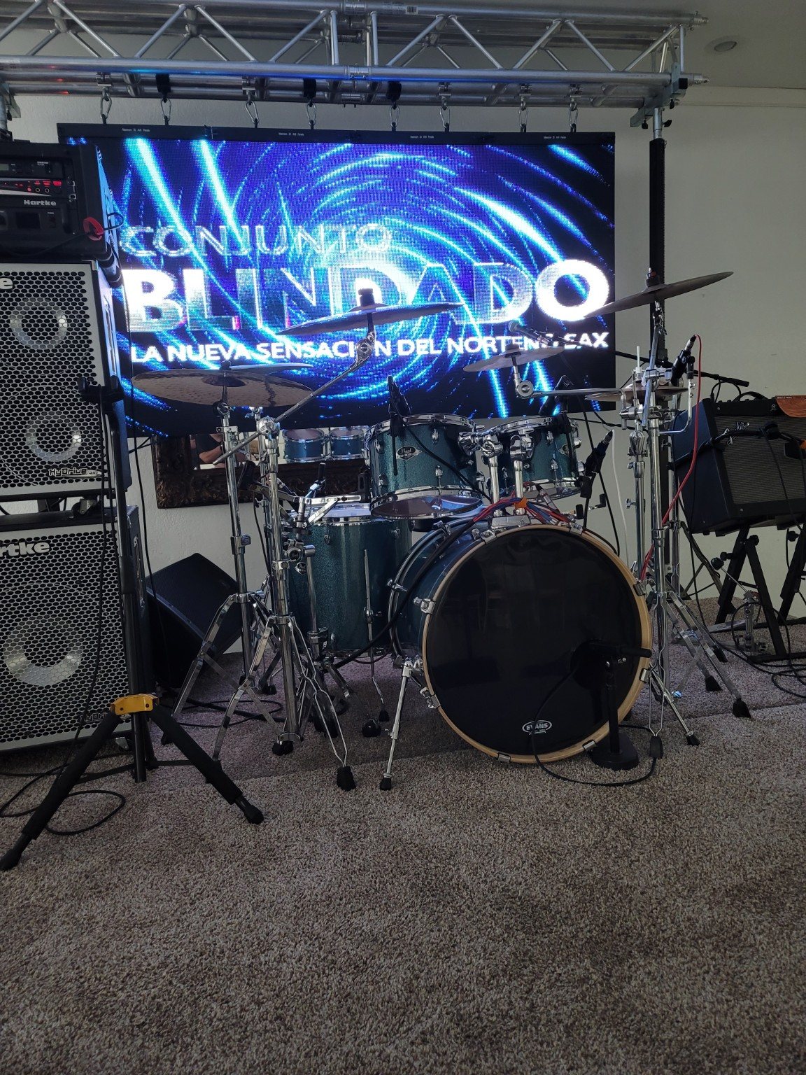 Complete drum backline on a professional stage with LED video