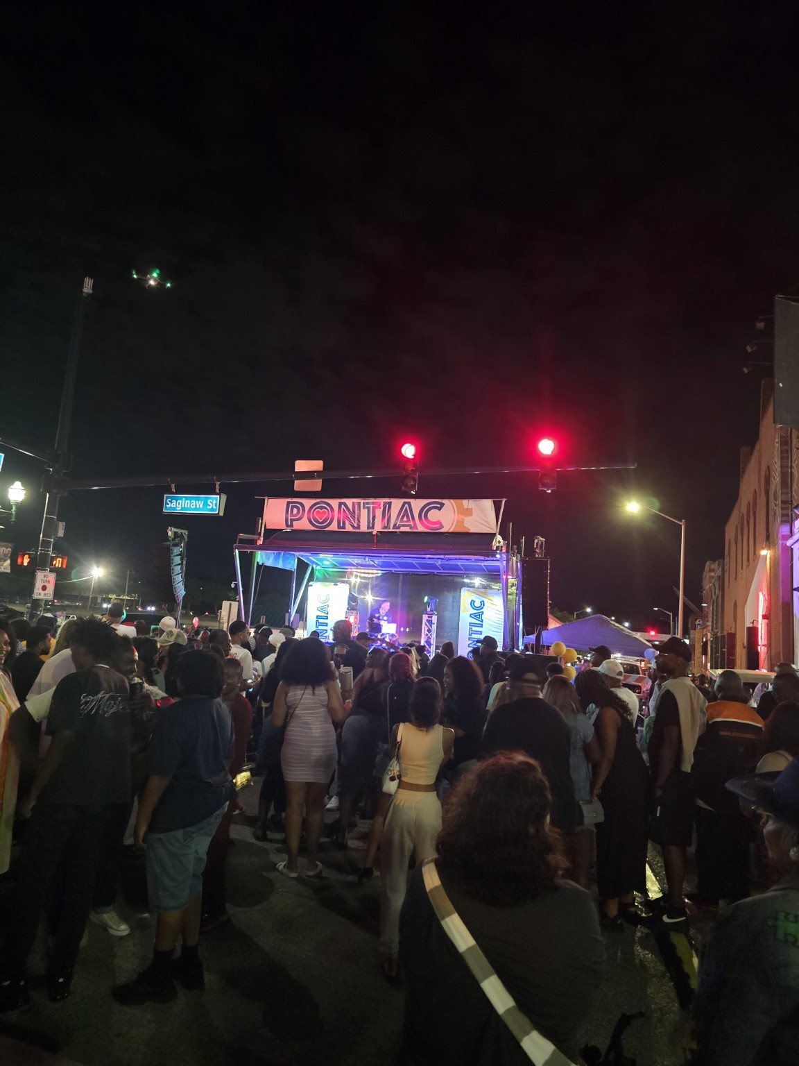 Downtown Pontiac nighttime street festival crowd